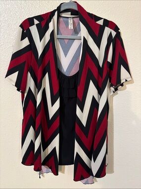 Per Seption women’s top in red, black, and white chevron with a layered design.